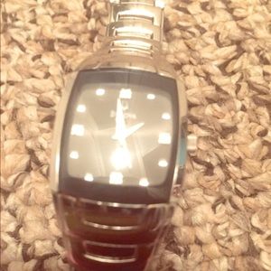Silver Bulova watch- women’s